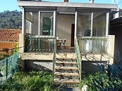 Appartement de 3/4 pièces dans haut de maison Niçoise, balcon, terrasse/véranda, cave et jardin.